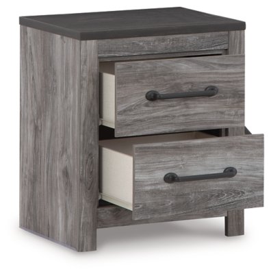 Bronyan King Panel Bed, Dresser, Mirror, Chest and 2 Nightstands - Image 12