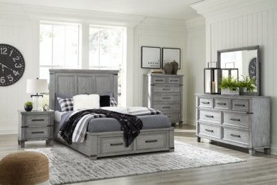 Russelyn Queen Panel Storage Bed, Dresser, Mirror, Chest and 2 Nightstands - Image 19