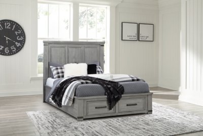 Russelyn Queen Panel Storage Bed, Dresser, Mirror, Chest and 2 Nightstands - Image 21