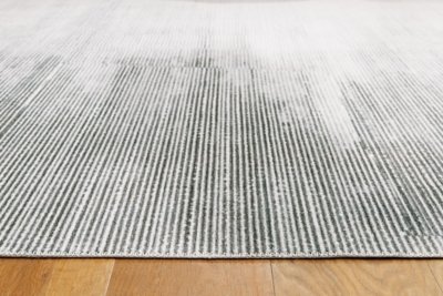 Milset 5'1" x 6'10" Washable Rug - Image 4