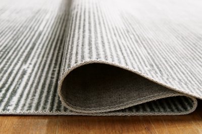 Milset 5'1" x 6'10" Washable Rug - Image 5