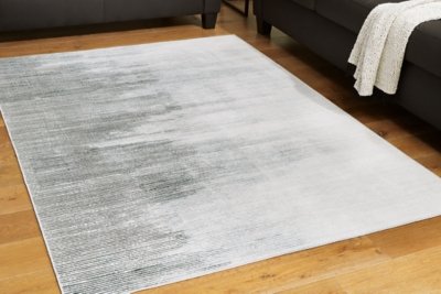 Milset 5'1" x 6'10" Washable Rug - Image 3