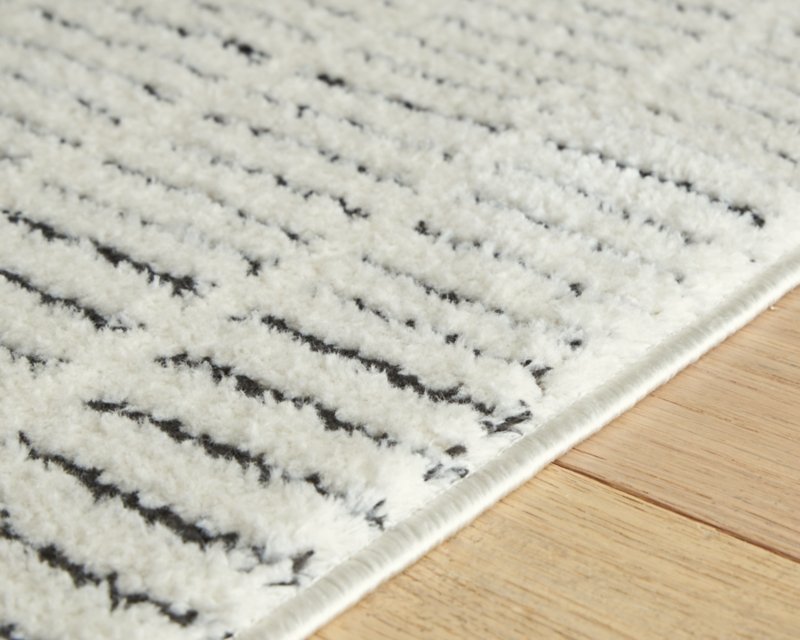 Turinwith 5'3" x 7' Area Rug - Image 4