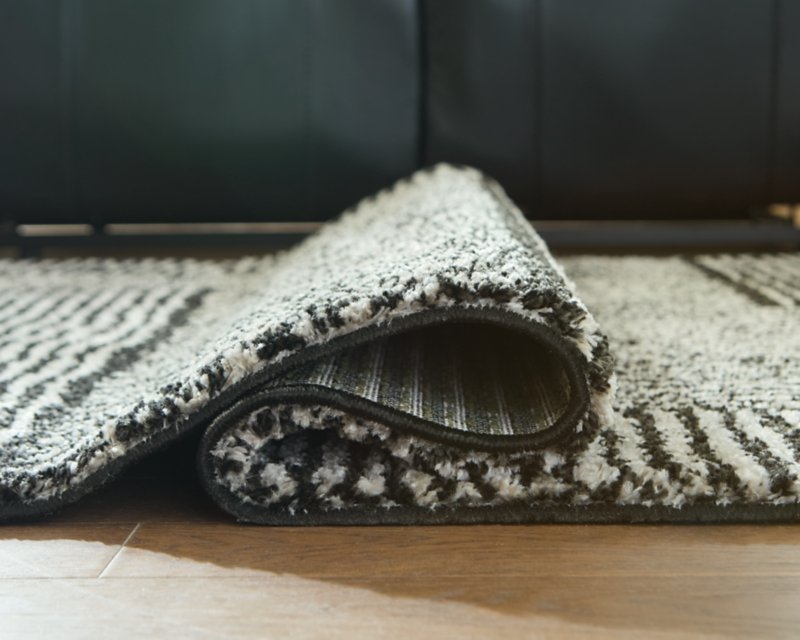 Kurtmen 7'10" x 9'10" Area Rug - Image 5