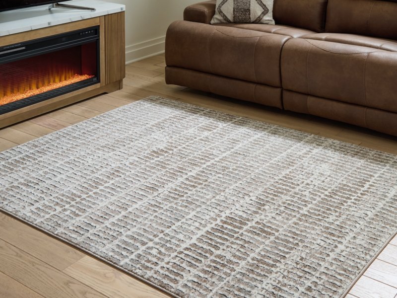 Fuadwick 5'3" x 7' Area Rug - Image 3